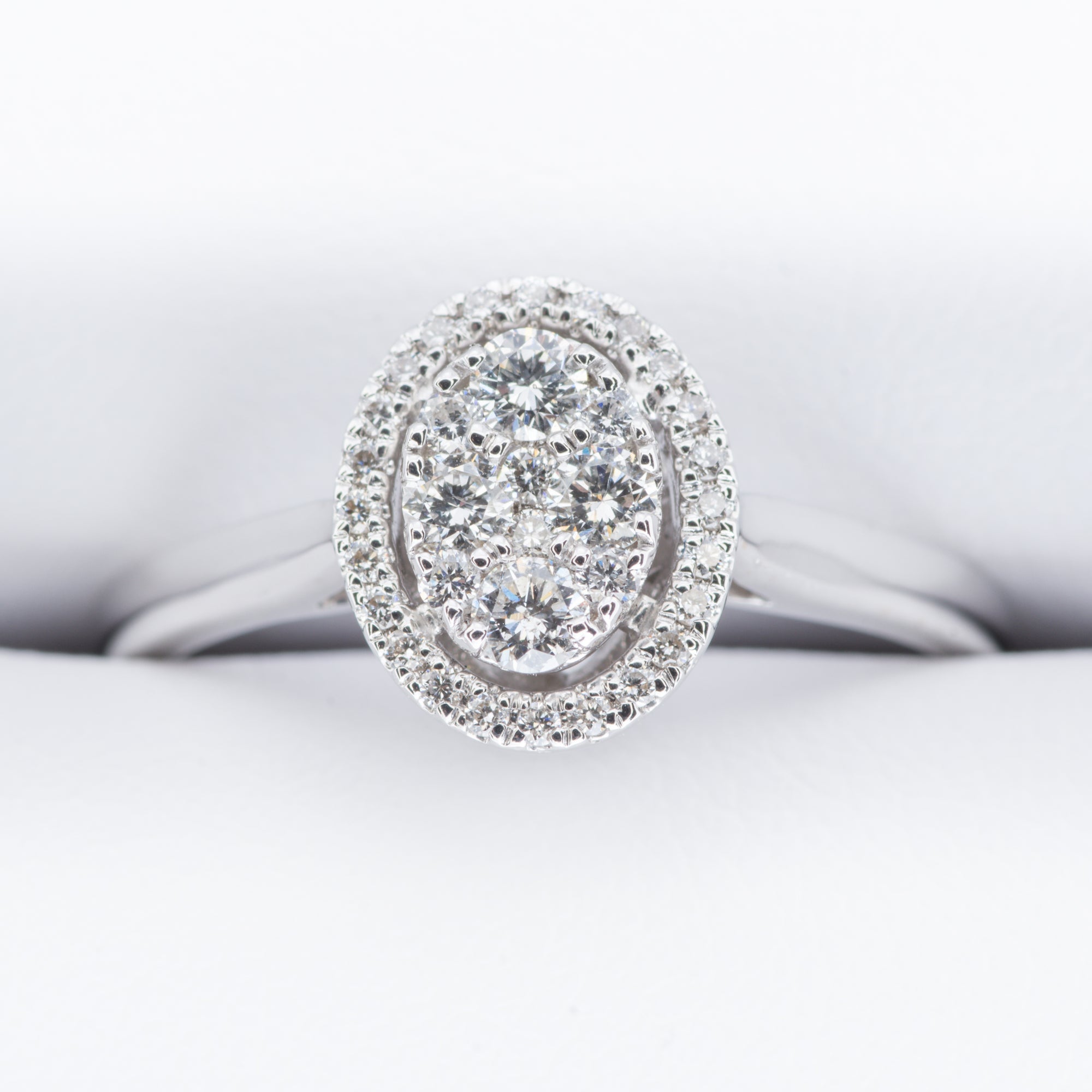 18ct White Gold Oval Diamond Halo Cluster Ring