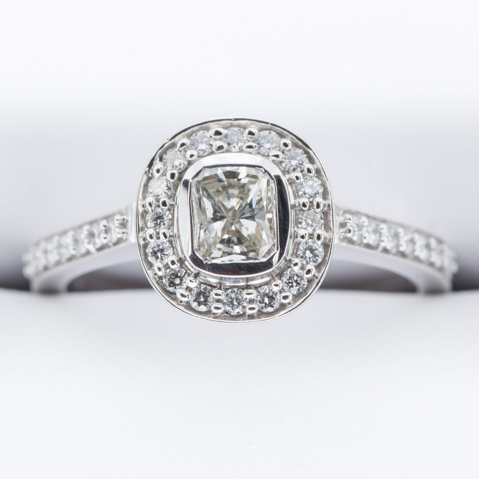 18ct Cushion Cut Rubover Grain Set Halo Diamond Ring