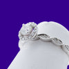 9ct White Gold .60ct Solitare Halo with pave twisted shoulders and matching Wedding band