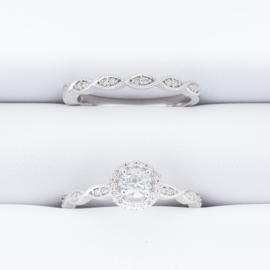 9ct White Gold .60ct Solitare Halo with pave twisted shoulders and matching Wedding band