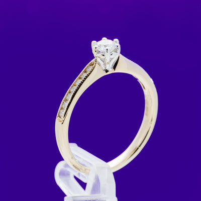 9ct Yellow Gold .33ct 6 claw Round Brilliant Solitaire with beaded channel set Shoulders
