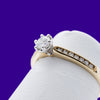 9ct Yellow Gold .33ct 6 claw Round Brilliant Solitaire with beaded channel set Shoulders